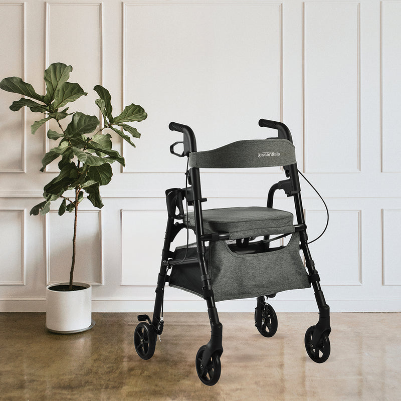 Black and gray rollator chair with a plant in the background