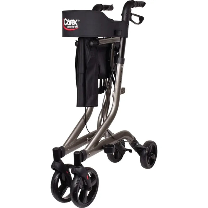 A Carex rollator walker with a metallic bronze frame, black wheels, and a black seat pad featuring the Carex brand logo, shown against a plain white background.