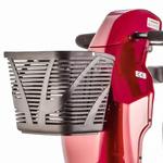Red kitchen appliance with a basket attachment on a white background