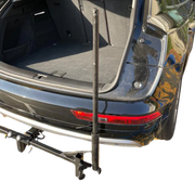 Car with a bike rack attached to the back