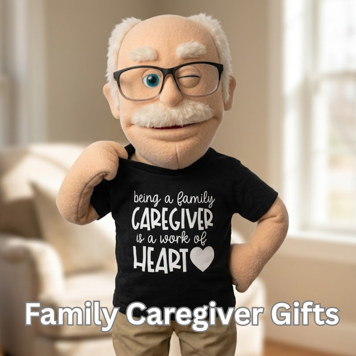 Plush toy resembling an elderly man wearing a black t-shirt with a message about family caregiving, set against a neutral indoor background.