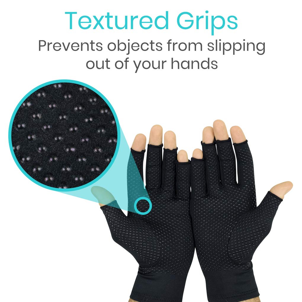 Black gloves with textured grips on a white background