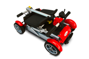 Red and black toy car on a white background