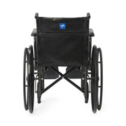 A black manual wheelchair shown from the rear view against a solid white background, featuring a black fabric seat cushion and backrest with a small blue and white logo patch.