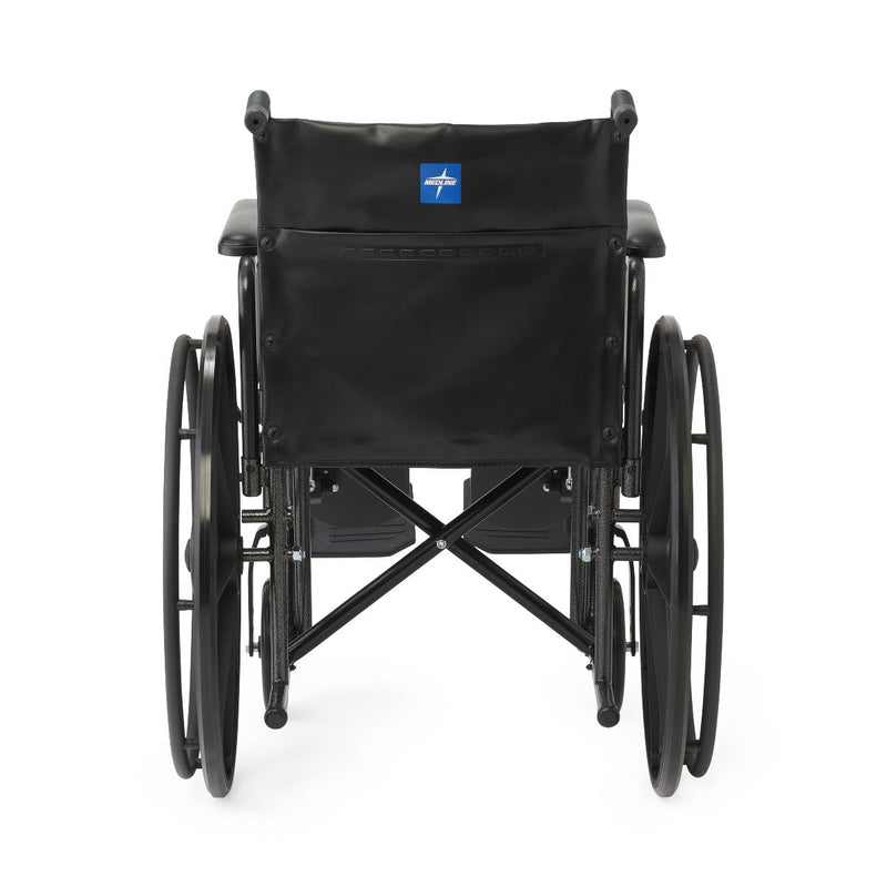 A black manual wheelchair shown from the rear view against a solid white background, featuring a black fabric seat cushion and backrest with a small blue and white logo patch.