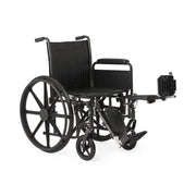A black manual wheelchair with a footrest extended, photographed from a three-quarters angle against a solid white background.