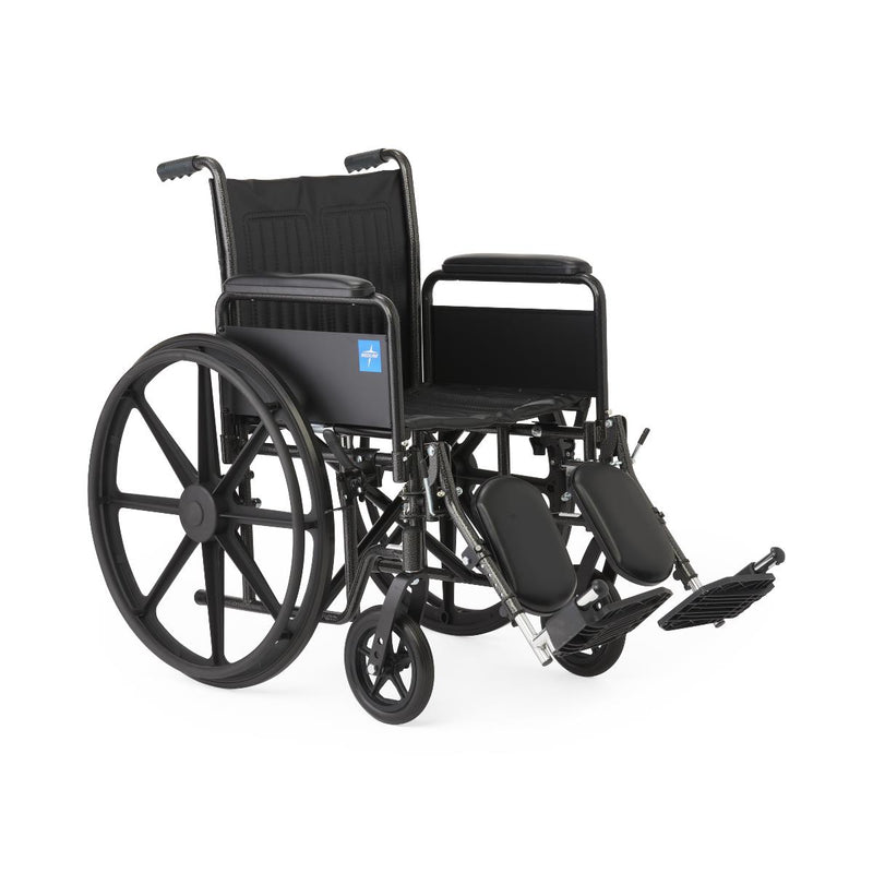 A black manual wheelchair with a padded seat and backrest, large spoked rear wheels, small front casters, and extended footrests, photographed on a clean white background.