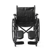 Black manual wheelchair on a white background