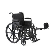 Black wheelchair with attached footrest on a white background