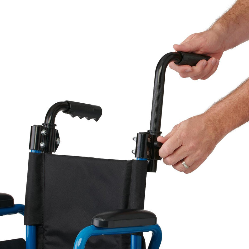 Hand holding a wheelchair handle with a white background
