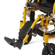 Close-up of a wheelchair frame and leg rest in bright yellow and black, showing the footrest, armrest support, and part of the wheel assembly on a white background.