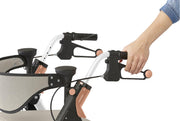 Person holding a rollator handlebar with a white background