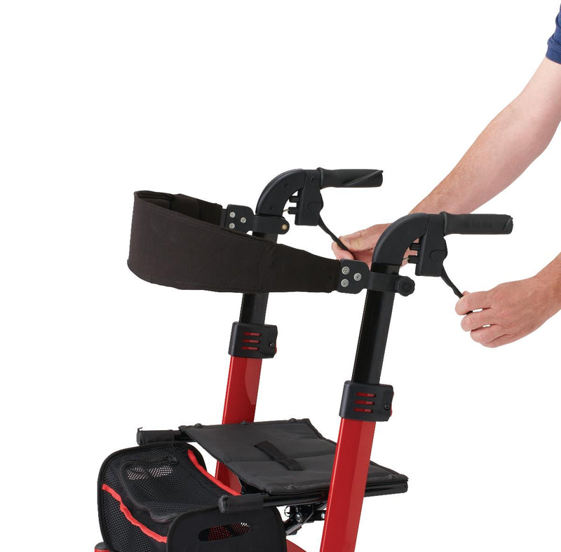 A close-up of a red and black walker or rollator being adjusted by a person's hands, with the person's arms visible against a plain white background.