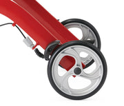 Close-up of a red scooter with wheels on a white background