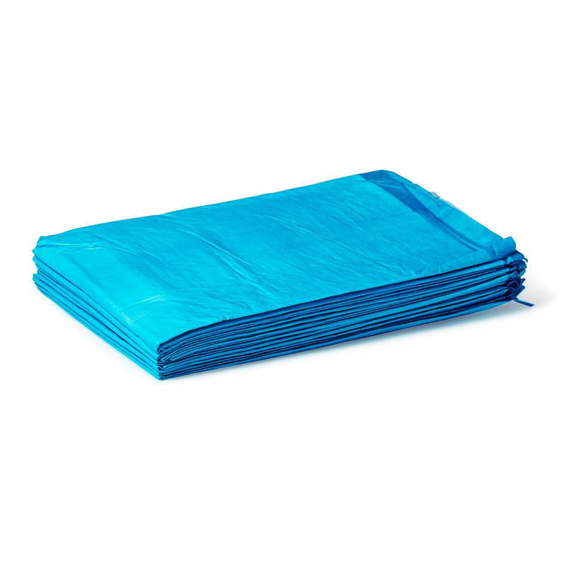 Folded blue underpad on a white background