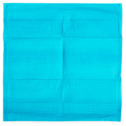 Turquoise underpad on a white background