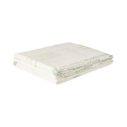 Folded white fabric on a white background
