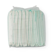 Stack of white disposable underpass with green trim on a white background