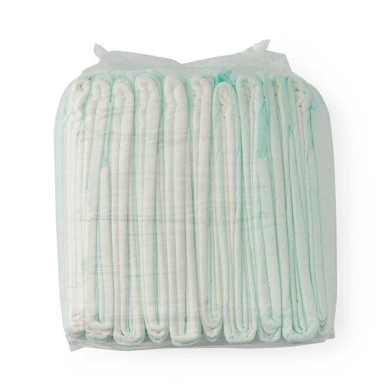 Stack of white disposable underpass with green trim on a white background