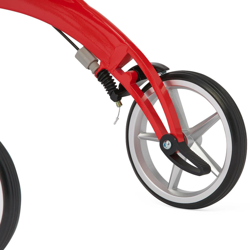 Close-up of a red bicycle wheel with suspension fork on a white background