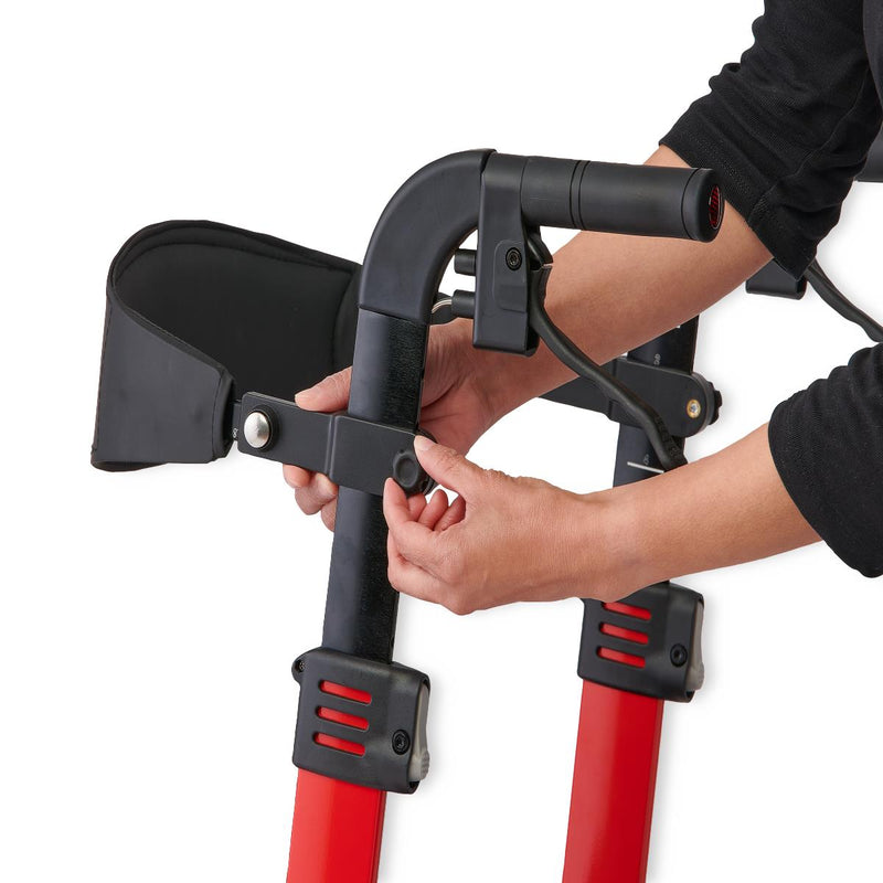 Person adjusting a red and black scooter handlebar on a white background