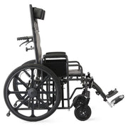 A black manual wheelchair shown from the side against a plain white background, with the footrest extended.