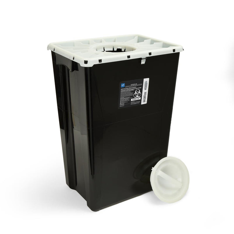 Black sharps container with a white lid and a small white container on a white background