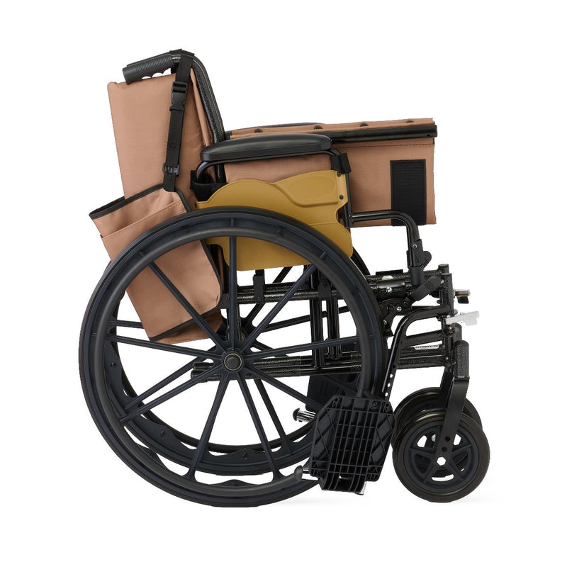 A black manual wheelchair with tan canvas side pockets and a matching backrest cover, shown from a side profile on a white background.