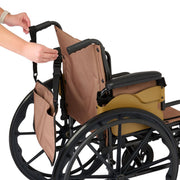 A tan fabric wheelchair accessory, including a backrest cover and side storage pocket, being adjusted onto a black manual wheelchair by a person's hands, shown against a solid white background.
