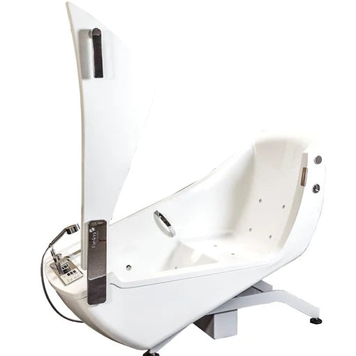 A white electric wheelchair lift with a high backrest, mounted on a metal support frame. The lift features a chrome-finished handbrake, control panel, and hose, shown against a plain white background.