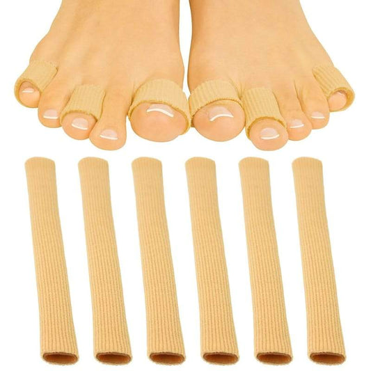 Beige toe separators with a pair of feet wearing them on a white background