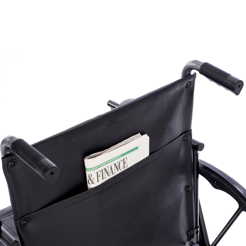 Wheelchair with a pocket holding a newspaper titled 'Finance'