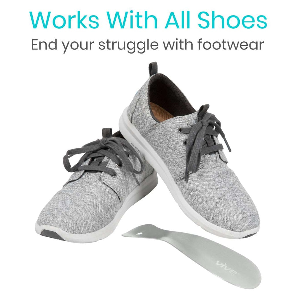 Gray sneakers with a white shoe horn on a white background, text 'Works With All Shoes' and 'End your struggle with footwear'.