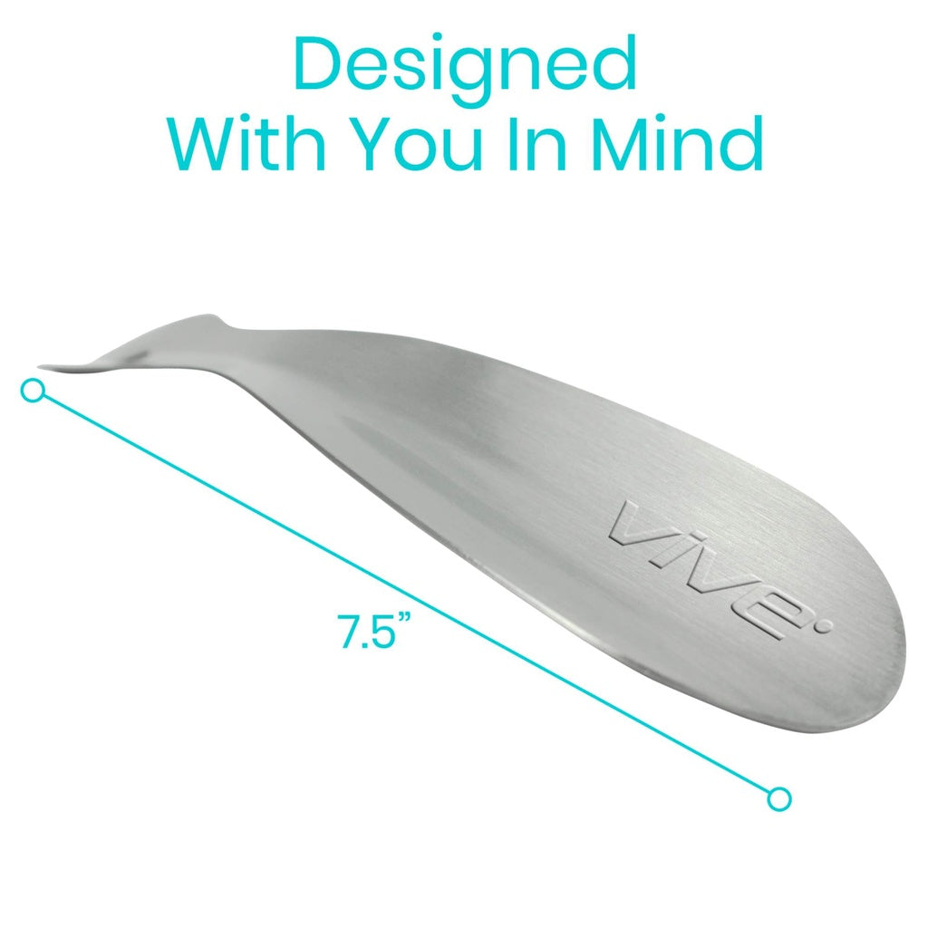 Metallic spoon with 'Vive' branding and measurement label on a white background