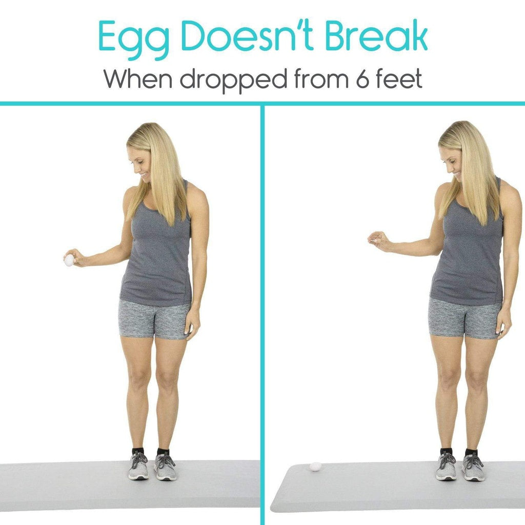 Woman holding an egg with text 'Egg Doesn't Break When Dropped from 6 Feet' on a white background