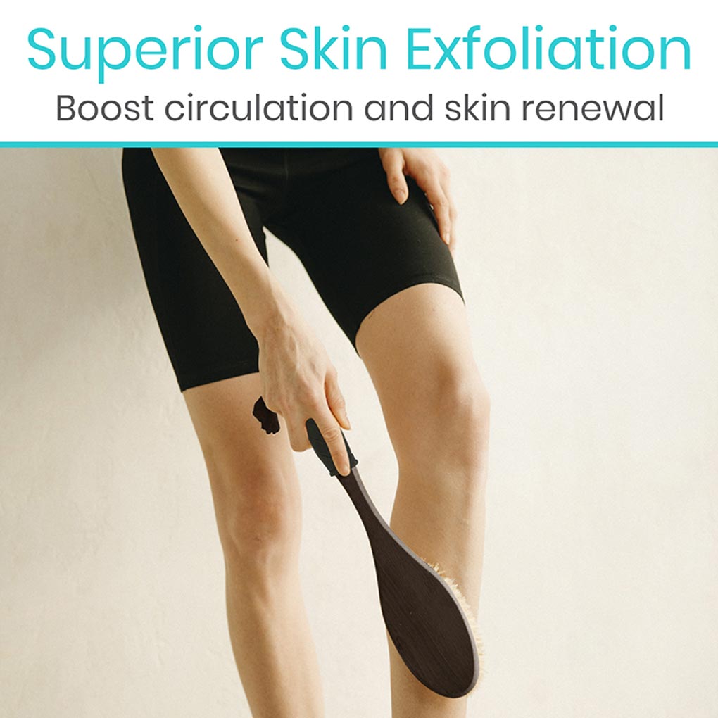 Person using a wooden exfoliating tool on their leg with text about superior skin exfoliation.