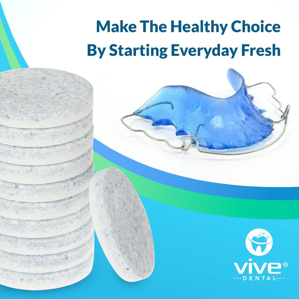 Stack of dental retainers and a blue mouthguard on a blue background with Vive Dental branding.