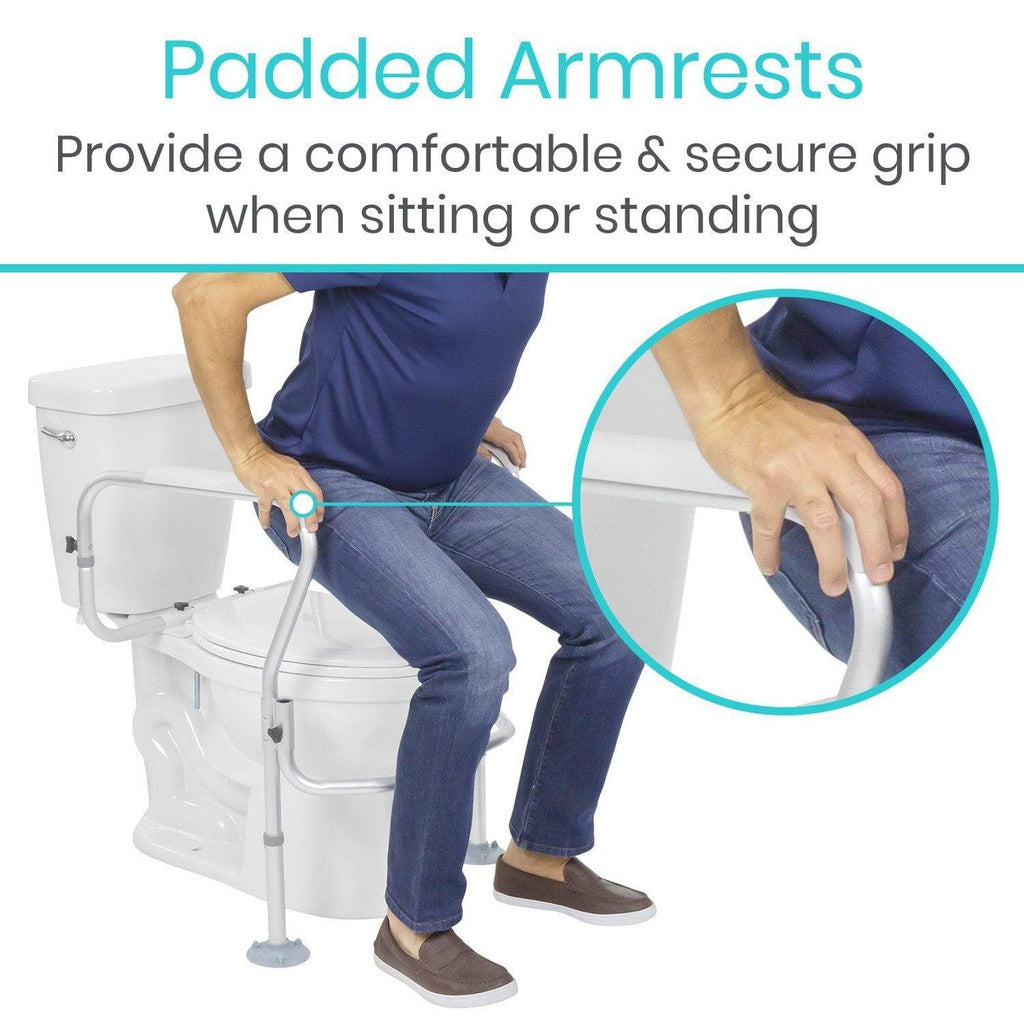 Person using a toilet with padded armrests for support, highlighting comfort and security.