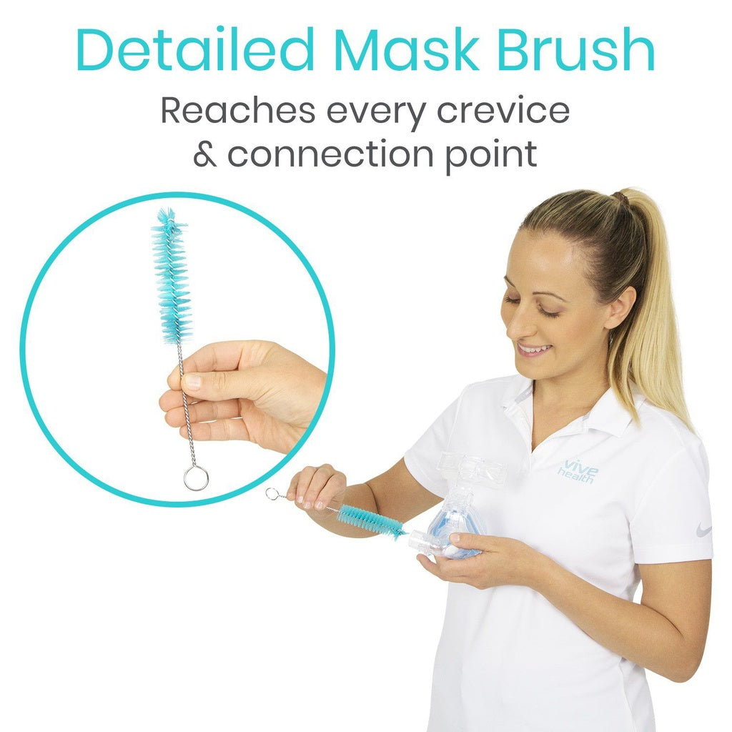 Woman using a detailed mask brush with text indicating its features