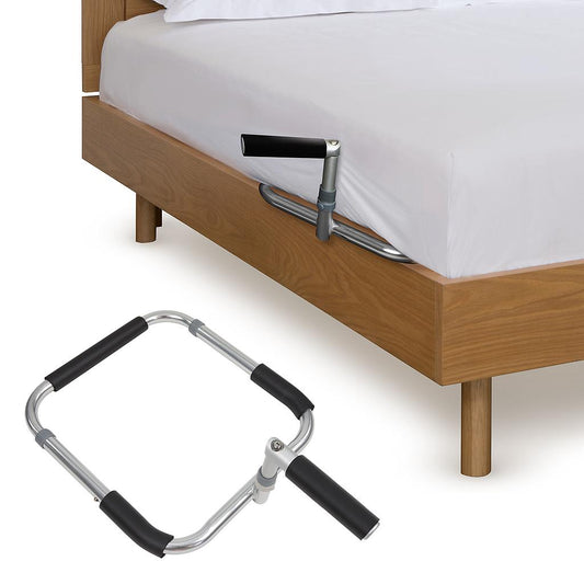 Bedside rail attached to a wooden bed with white mattress