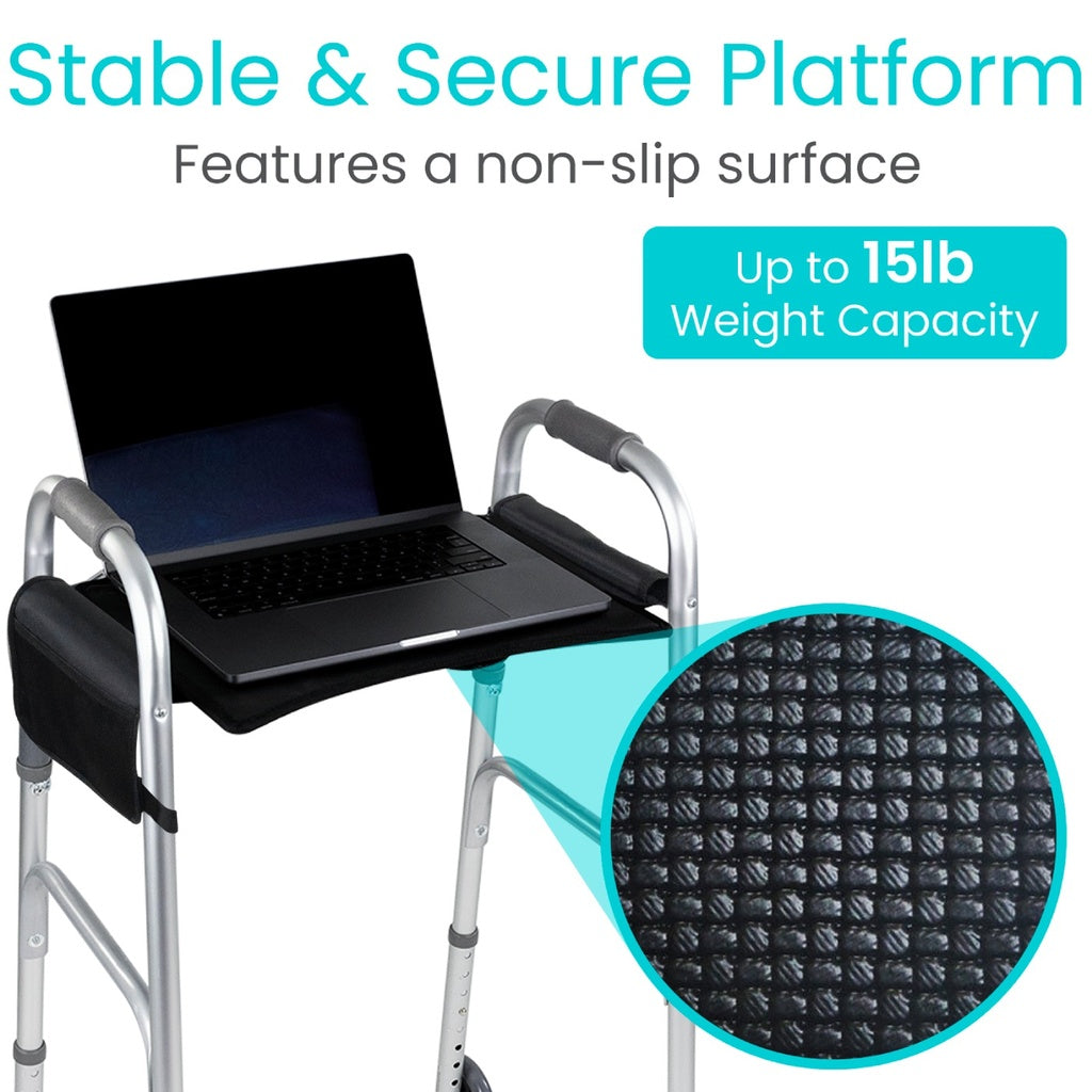 Laptop tray attached to a walker with text about stability, security, non-slip surface, and weight capacity.