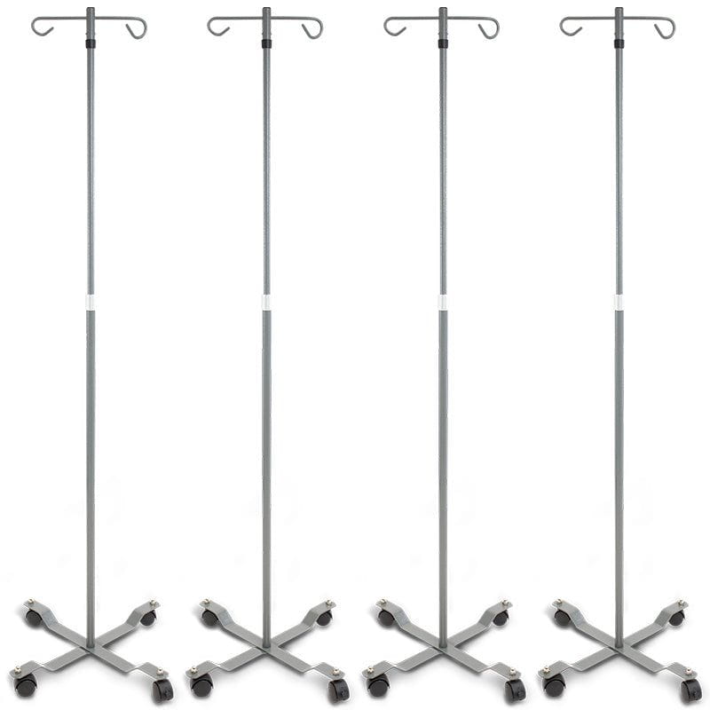 Four medical IV stands with wheels on a white background