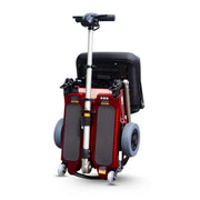 Red electric wheelchair on a white background