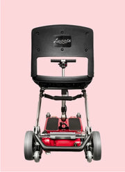 Red and black scooter with 'Luggie' branding on a pink background