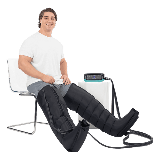 Person using a leg massager with a clear background
