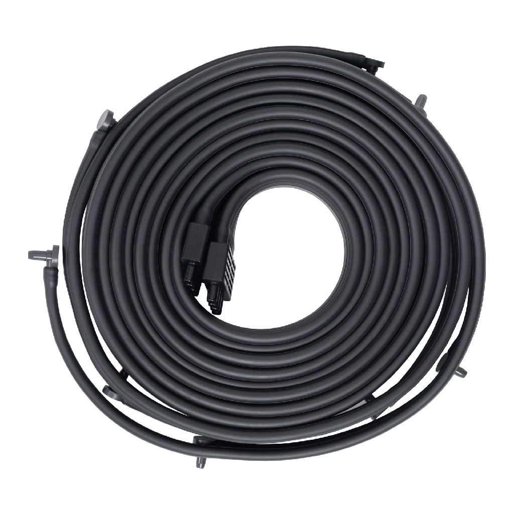 Coiled black garden hose on a white background