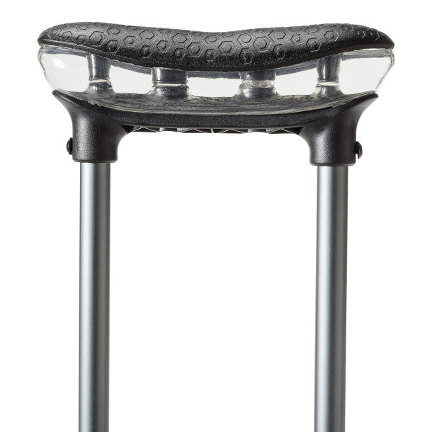 Close-up of a black and clear scooter seat on a white background