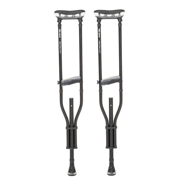 Pair of black crutches on a white background
