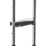 Metal crutch with a plastic handle on a white background