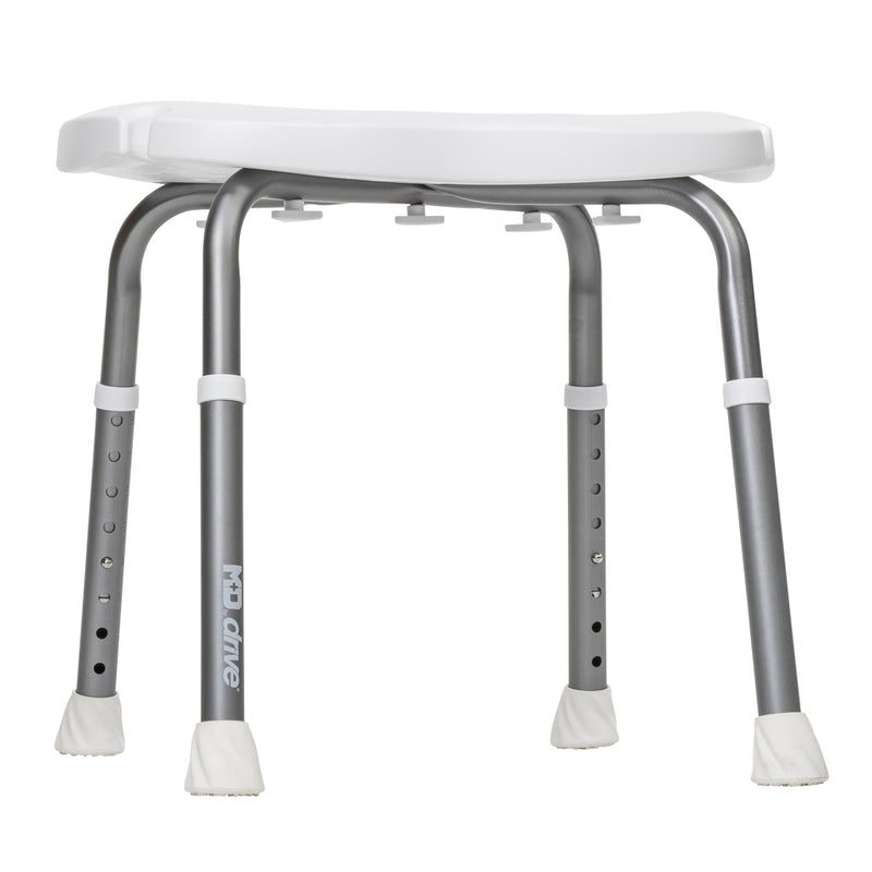 A gray adjustable shower stool with a white plastic seat and white protective foot caps, shown on a plain white background.